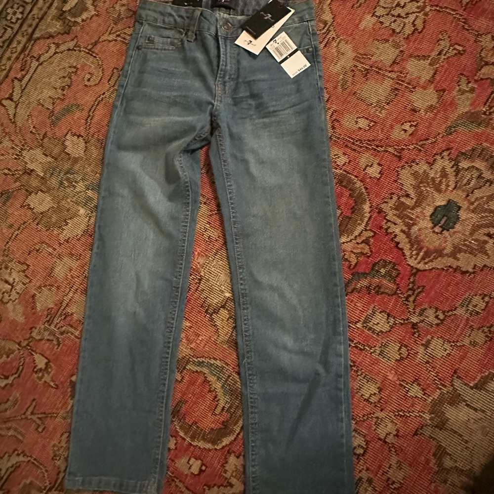 Boys Seven for all mankind jeans (slimmy) size 8 
NEVER WORN
Tags still on